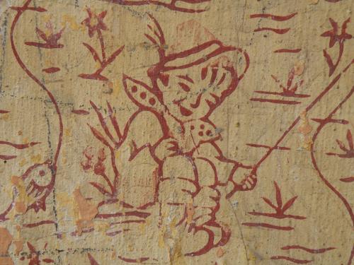 Lakószoba festékhengerrel mintázott falrészlete